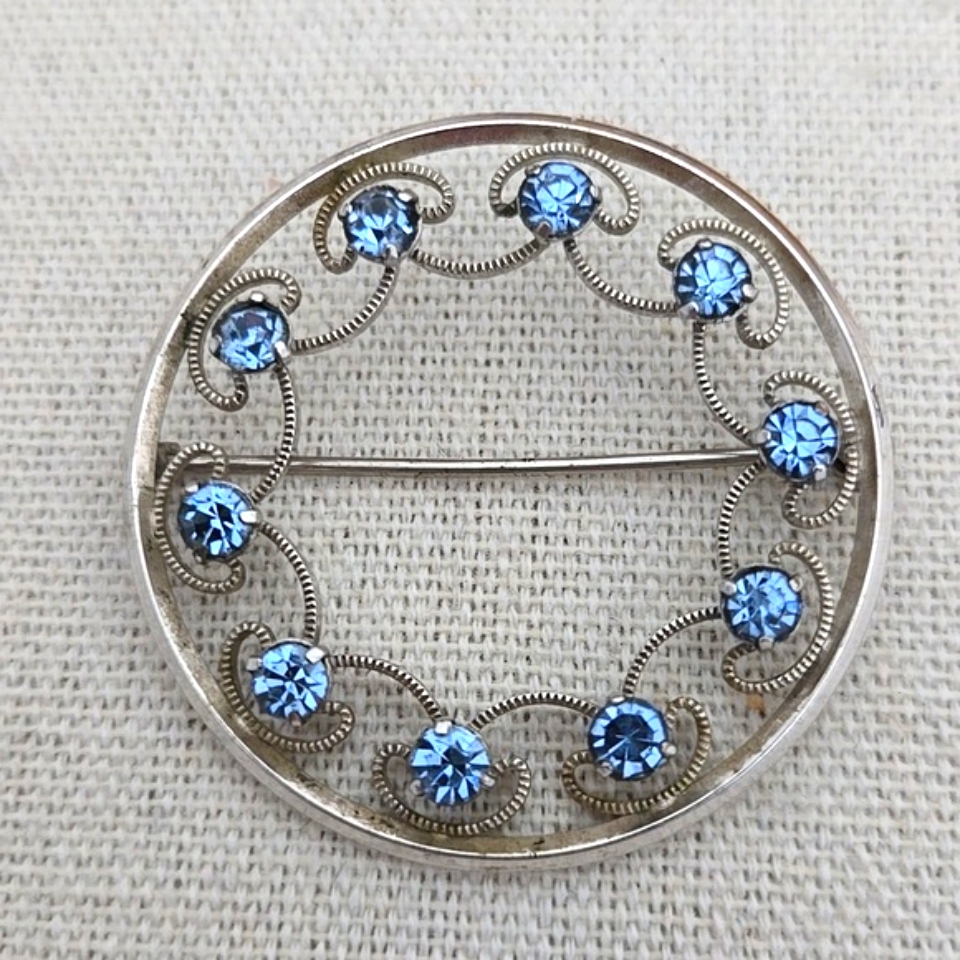 Krementz Blue Rhinestone Silver Circle Brooch Signed